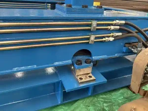 Hydraulic container tilter with weighing
