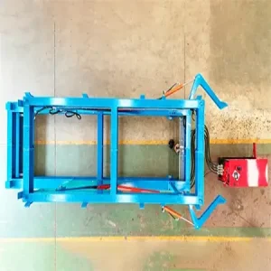 Hydraulic container tilter with weighing