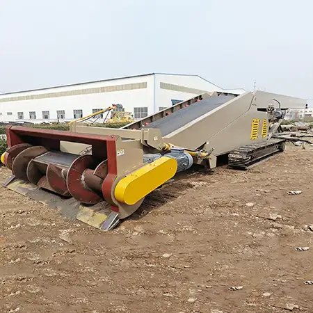 Self-feeding truck loader